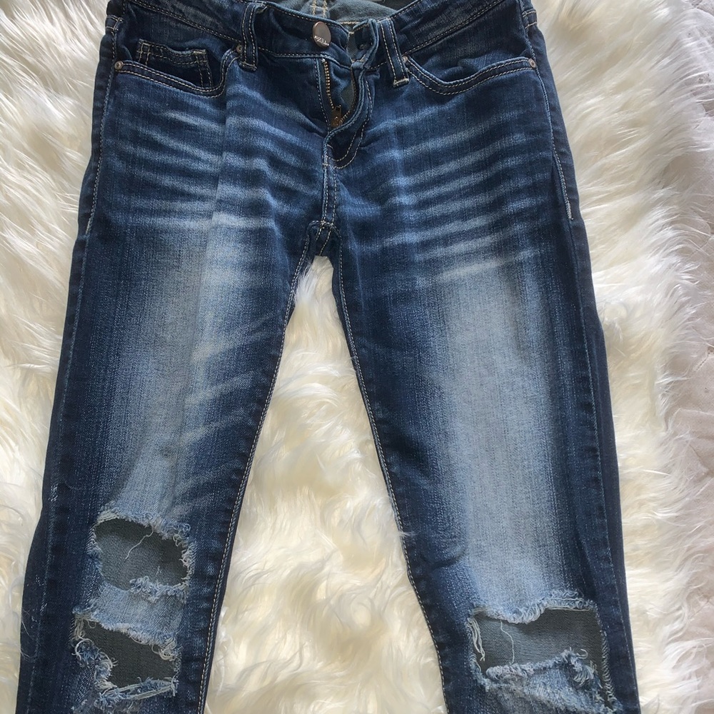 Distressed skinny jeans